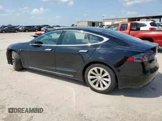2016 Tesla Model S 90D с VIN 5YJSA1E21GF168439, выставлен на аукционе Copart как лот 60703035 с пробегом 102 905 миль миль и Списание • Salvage title. История ставок и продаж доступна на DreamBid. Изображение 2.