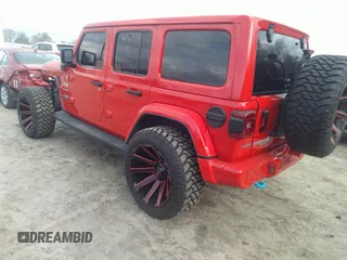 2022 Jeep Wrangler Unlimited Sahara with VIN 1C4JJXP62NW136932, listed as a IAAI auction lot 41486025 with 36,986 mi miles and . Bid and sale history available at DreamBid. Image 3.