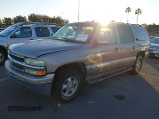 2003 Chevrolet Suburban LS with VIN 1GNEC16T43J269726, listed as a IAAI auction lot 41109855 with 122,820 mi miles. Bid and sale history available at carsss.com. Image 2.