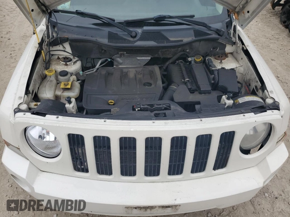 2010 Jeep Patriot Sport z VIN 1J4NF1GB2AD620340, wystawiony jako Copart lot #73360454 z przebiegiem 213 676 mil mil oraz Nie do naprawy • Non repairable. Historia ofert i sprzedaży dostępna na DreamBid. Obrazek 11.