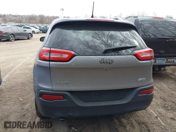 2016 Jeep Cherokee Latitude with VIN 1C4PJMCB7GW252724, listed as a IAAI auction lot 41869060 with 125,119 mi miles. Bid and sale history available at carsss.com. Image 16.