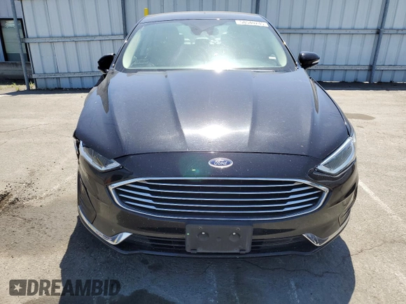2020 Ford Fusion SEL z VIN 3FA6P0CD5LR193714, wystawiony jako Copart lot #58540245 z przebiegiem 82 831 mil mil oraz Szkoda całkowita • Salvage title. Historia ofert i sprzedaży dostępna na DreamBid. Obrazek 5.