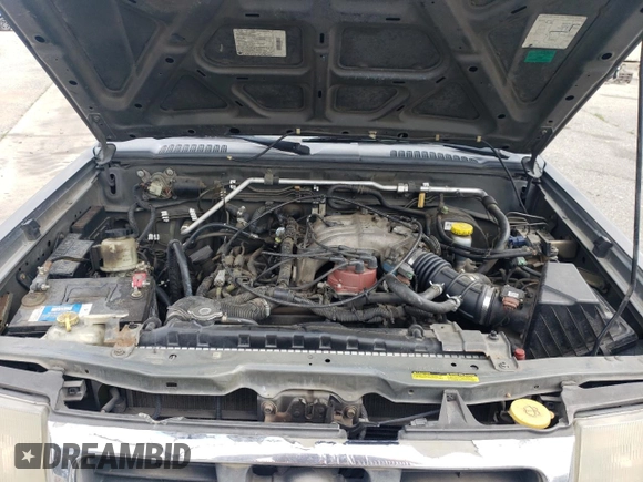 2000 Nissan Frontier XE with VIN 1N6ED27T5YC426456, listed as a Copart auction lot 54411425 with 117,600 mi miles and Salvage title. Bid and sale history available at DreamBid. Image 11.