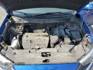 2016 Mitsubishi Outlander Sport SE z VIN JA4AJ4AW9GZ612953, wystawiony jako Copart lot #59866055 z przebiegiem 97 710 mil mil oraz Szkoda całkowita • Salvage title. Historia ofert i sprzedaży dostępna na DreamBid. Obrazek 12.