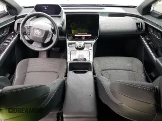 2023 Toyota bZ4X XLE with VIN JTMAAAAA2PA027753, listed as a Copart auction lot 39182674 with 921 mi miles and . Bid and sale history available at DreamBid. Image 8.