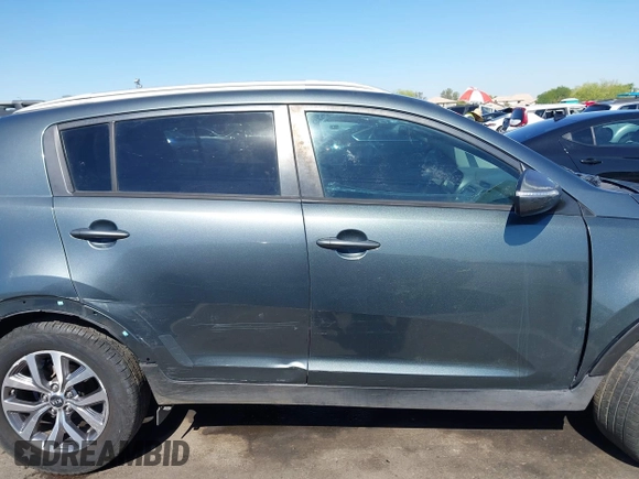 2015 Kia Sportage LX with VIN KNDPB3ACXF7696918, listed as a IAAI auction lot 42179023 with 64,181 mi miles and . Bid and sale history available at DreamBid. Image 13.