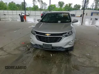 2018 Chevrolet Equinox LT с VIN 3GNAXJEV9JL291278, выставлен на аукционе Copart как лот 60251975 с пробегом 85 547 миль миль и Списание • Salvage title. История ставок и продаж доступна на DreamBid. Изображение 14.