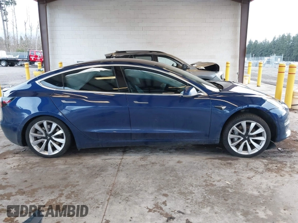 2018 Tesla Model 3 Long Range Battery z VIN 5YJ3E1EA7JF035949, wystawiony jako IAAI lot #41627027 z przebiegiem Nie podano mil oraz . Historia ofert i sprzedaży dostępna na DreamBid. Obrazek 13.