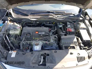 2020 Honda Civic LX with VIN 2HGFC2F6XLH533726, listed as a IAAI auction lot 41633882 with 141,835 mi miles and . Bid and sale history available at DreamBid. Image 10.