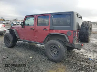 2012 Jeep Wrangler Unlimited Rubicon with VIN 1C4HJWFG2CL219021, listed as a Copart auction lot 87451784 with 109,675 mi miles and Salvage title. Bid and sale history available at DreamBid. Image 2.