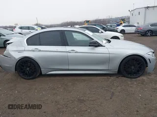 2018 BMW 3 Series 330i xDrive with VIN WBA8D9C55JA607605, listed as a IAAI auction lot 41682994 with 79,285 mi miles and . Bid and sale history available at DreamBid. Image 13.