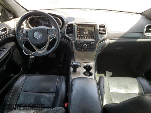 2014 Jeep Grand Cherokee Limited with VIN 1C4RJFBG4EC265947, listed as a Copart auction lot 52448155 with 127,700 mi miles and Salvage title. Bid and sale history available at DreamBid. Image 8.