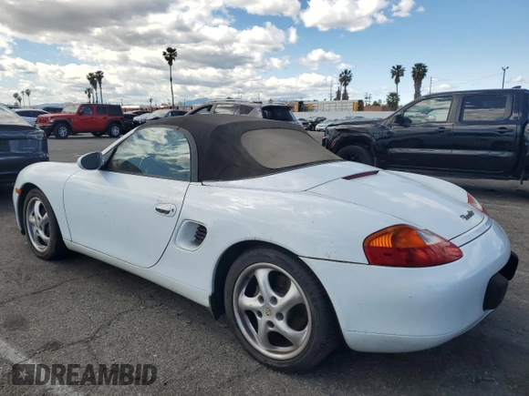 1999 Porsche Boxster z VIN WP0CA2984XU629987, wystawiony jako Copart lot #51366845 z przebiegiem Nie podano mil oraz Czysty tytuł • Clean title. Historia ofert i sprzedaży dostępna na DreamBid. Obrazek 2.
