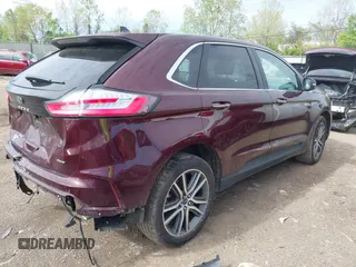2021 Ford Edge Titanium with VIN 2FMPK4K99MBA41965, listed as a IAAI auction lot 42114607 with 87,848 mi miles and . Bid and sale history available at DreamBid. Image 4.