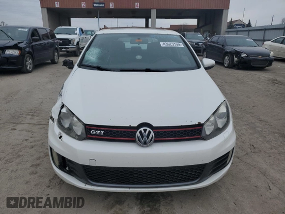 2012 Volkswagen GTI PZEV z VIN WVWED7AJ9CW107107, wystawiony jako Copart lot #43623155 z przebiegiem 193 560 mil mil oraz Szkoda całkowita • Salvage title. Historia ofert i sprzedaży dostępna na DreamBid. Obrazek 5.