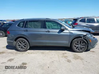 2023 Volkswagen Tiguan SE with VIN 3VV3B7AX5PM142378, listed as a IAAI auction lot 41835204 with 13,670 mi miles and . Bid and sale history available at DreamBid. Image 13.