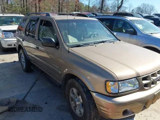 2001 Isuzu Rodeo S with VIN 4S2CK58W414322118, listed as a IAAI auction lot 41496624 with 244,189 mi miles and . Bid and sale history available at DreamBid. Image 1.