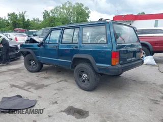 1996 Jeep Cherokee SE z VIN 1J4FJ28S8TL285634, wystawiony jako IAAI lot #42183816 z przebiegiem 260 237 mil mil oraz . Historia ofert i sprzedaży dostępna na DreamBid. Obrazek 3.