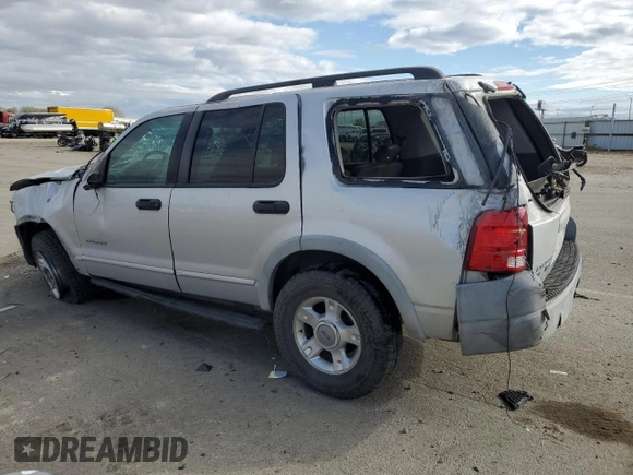 2002 Ford Explorer XLS with VIN 1FMZU72E02UA28983, listed as a Copart auction lot 56871915 with Not provided miles and Salvage title. Bid and sale history available at DreamBid. Image 2.