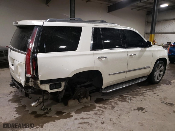 2015 Cadillac Escalade Luxury with VIN 1GYS4BKJ9FR157930, listed as a Copart auction lot 71779094 with 121,077 mi miles and Salvage Title. Bid and sale history available at carsss.com. Image 3.
