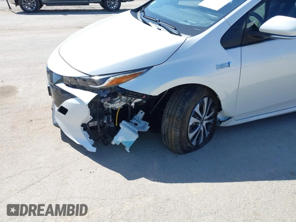 2021 Toyota Prius LE with VIN JTDKAMFP8M3174629, listed as a IAAI auction lot 42087974 with 16,348 mi miles and . Bid and sale history available at DreamBid. Image 6.