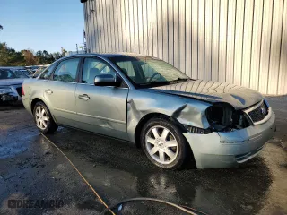 2006 Ford Five Hundred SE with VIN 1FAFP23116G118070, listed as a Copart auction lot 83662444 with 113,189 mi miles and Salvage Title. Bid and sale history available at carsss.com. Image 4.