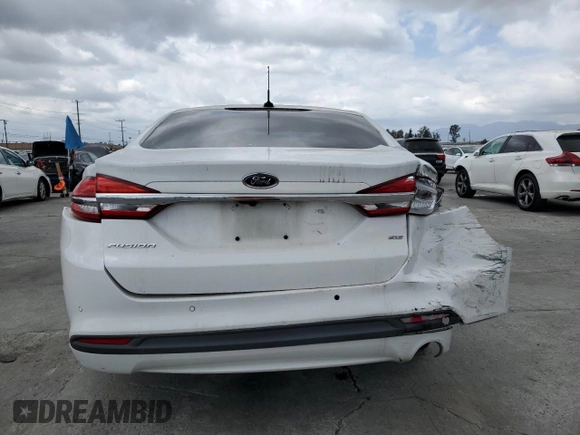 2018 Ford Fusion SE with VIN 3FA6P0H79JR177113, listed as a Copart auction lot 54398785 with 112,651 mi miles and Salvage Title. Bid and sale history available at carsss.com. Image 6.