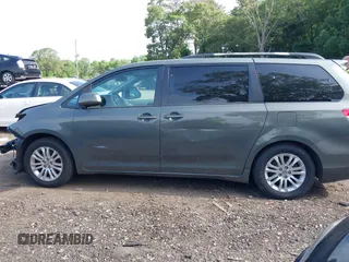 2012 Toyota Sienna XLE AAS with VIN 5TDYK3DC5CS181116, listed as a IAAI auction lot 42511625 with 120,721 mi miles and . Bid and sale history available at DreamBid. Image 13.