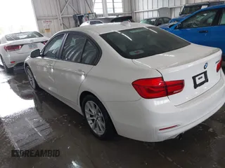 2018 BMW 3 Series 320i with VIN WBA8A9C57JAH13937, listed as a IAAI auction lot 41979917 with 268,115 mi miles. Bid and sale history available at carsss.com. Image 3.
