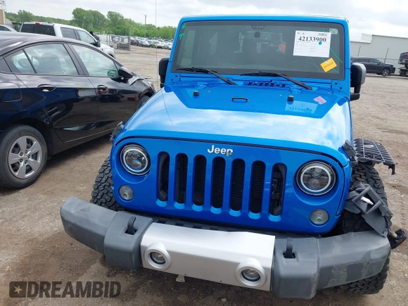 2015 Jeep Wrangler Sahara with VIN 1C4AJWBG9FL663959, listed as a IAAI auction lot 42133900 with 56,253 mi miles and . Bid and sale history available at DreamBid. Image 13.