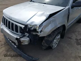 2007 Jeep Grand Cherokee Laredo with VIN 1J8HR48P77C570936, listed as a IAAI auction lot 41945531 with 200,821 mi miles. Bid and sale history available at carsss.com. Image 6.