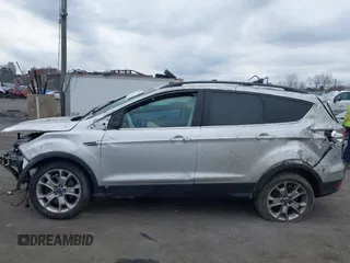 2013 Ford Escape SEL with VIN 1FMCU9H92DUA90495, listed as a IAAI auction lot 41780306 with 139,979 mi miles. Bid and sale history available at carsss.com. Image 6.