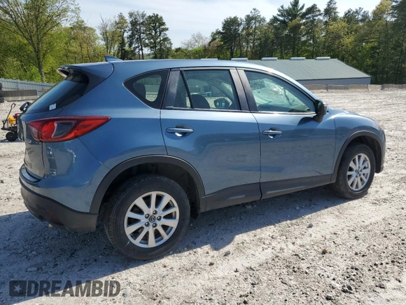 2016 Mazda CX-5 Sport with VIN JM3KE4BY8G0745522, listed as a Copart auction lot 56621825 with 98,757 mi miles and Salvage title. Bid and sale history available at DreamBid. Image 3.