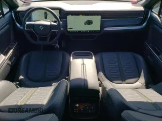 2023 Rivian R1S Adventure with VIN 7PDSGABA3PN012584, listed as a Copart auction lot 47557575 with 8,633 mi miles and Salvage Title. Bid and sale history available at carsss.com. Image 8.