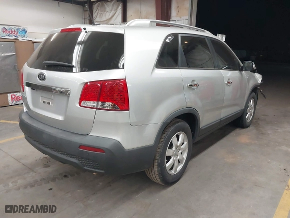2013 Kia Sorento LX with VIN 5XYKT3A69DG389015, listed as a IAAI auction lot 41852399 with 52,407 mi miles. Bid and sale history available at carsss.com. Image 4.
