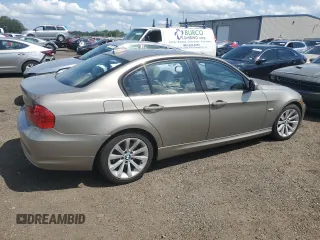 2011 BMW 3 Series 328i with VIN WBAPH5C55BA440544, listed as a Copart auction lot 61557015 with 135,252 mi miles and Salvage title. Bid and sale history available at DreamBid. Image 3.
