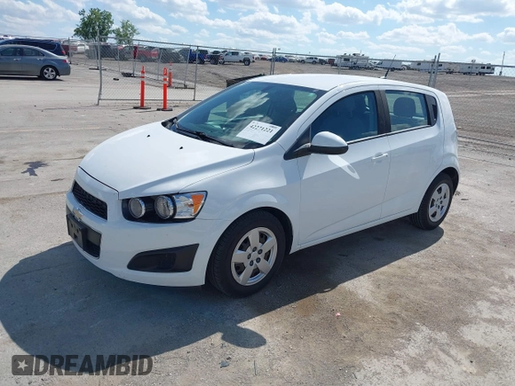2014 Chevrolet Sonic LS with VIN 1G1JA6SH5E4171729, listed as a IAAI auction lot 42271221 with 58,117 mi miles and . Bid and sale history available at DreamBid. Image 2.