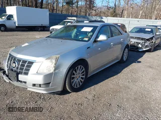 2012 Cadillac CTS Sedan Luxury with VIN 1G6DG5E50C0116725, listed as a IAAI auction lot 41694928 with 114,214 mi miles. Bid and sale history available at carsss.com. Image 2.