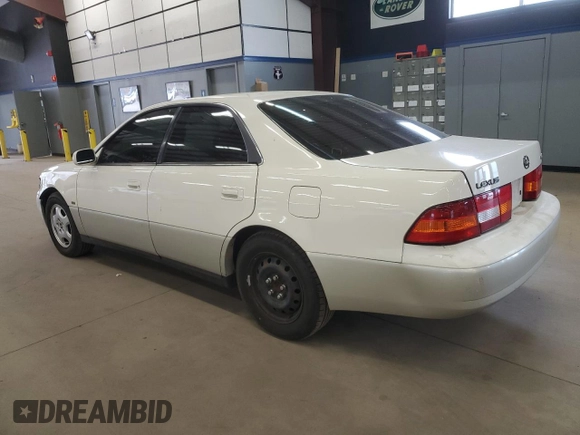 1999 Lexus ES 300 Luxury Sport Sdn with VIN JT8BF28G3X0205731, listed as a Copart auction lot 54057085 with 146,207 mi miles and Salvage Title. Bid and sale history available at carsss.com. Image 2.