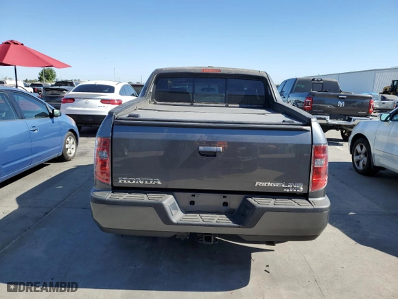 2011 Honda Ridgeline RTL with VIN 5FPYK1F58BB452957, listed as a Copart auction lot 63214204 with 223,311 mi miles and Salvage Title. Bid and sale history available at carsss.com. Image 6.