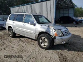 2004 Suzuki XL-7 LX with VIN JS3TY92V744104987, listed as a Copart auction lot 43455315 with 211,431 mi miles and Salvage Title. Bid and sale history available at carsss.com. Image 4.