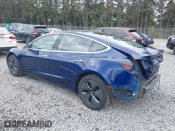 2018 Tesla Model 3 Long Range Battery z VIN 5YJ3E1EBXJF092025, wystawiony jako IAAI lot #42268369 z przebiegiem 132 687 mil mil oraz . Historia ofert i sprzedaży dostępna na DreamBid. Obrazek 3.