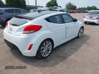 2012 Hyundai Veloster w/Gray Int with VIN KMHTC6AD3CU051395, listed as a IAAI auction lot 42489038 with 153,319 mi miles and . Bid and sale history available at DreamBid. Image 4.