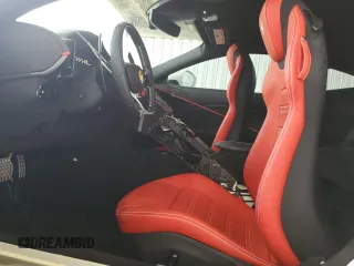 2024 Ferrari Roma z VIN ZFF98RNA4R0301164, wystawiony jako Copart lot #61120144 z przebiegiem 1263 mil mil oraz Nie do naprawy. Historia ofert i sprzedaży dostępna na DreamBid. Obrazek 7.