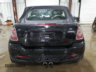 2013 MINI Convertible S with VIN WMWZP3C51DT297891, listed as a Copart auction lot 56745065 with 101,292 mi miles and Salvage title. Bid and sale history available at DreamBid. Image 6.