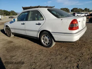 1994 Mercedes-Benz C 230/260/280/320 with VIN WDBHA28E6RF098536, listed as a Copart auction lot 77804734 with 181,285 mi miles and Clean Title. Bid and sale history available at carsss.com. Image 2.
