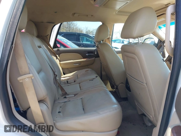 2013 Chevrolet Tahoe LTZ with VIN 1GNSKCE08DR161606, listed as a IAAI auction lot 41984912 with 189,181 mi miles and . Bid and sale history available at DreamBid. Image 8.