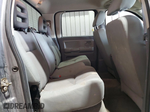2005 Dodge Dakota SLT z VIN 1D7HW48N95S166589, wystawiony jako Copart lot #54868565 z przebiegiem 228 682 mil mil oraz Szkoda całkowita • Salvage title. Historia ofert i sprzedaży dostępna na DreamBid. Obrazek 10.