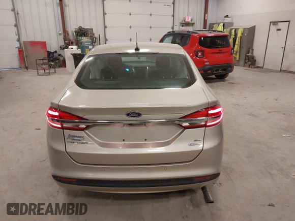 2018 Ford Fusion SE z VIN 3FA6P0HD2JR201693, wystawiony jako IAAI lot #42012709 z przebiegiem 110 857 mil mil oraz . Historia ofert i sprzedaży dostępna na DreamBid. Obrazek 16.