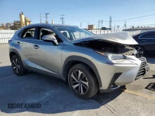 2021 Lexus NX 300 with VIN JTJGARBZ7M2191564, listed as a Copart auction lot 57974155 with 52,499 mi miles and Salvage title. Bid and sale history available at DreamBid. Image 4.